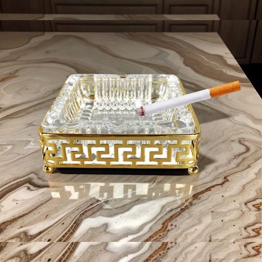 Elegant golden tray used as a modern tabletop accessory for coffee table and office desk décor