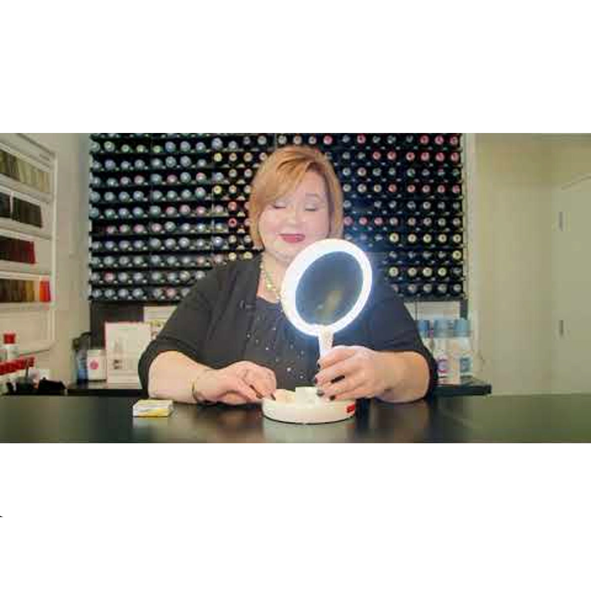 Stylish makeup mirror with swivel base and light-up frame