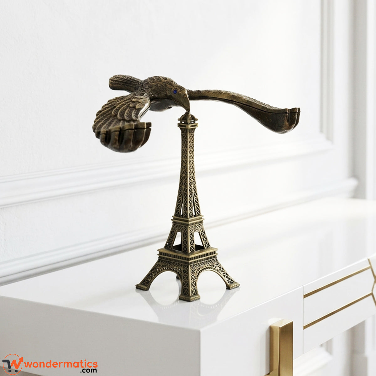 Antique eagle statue with Eiffel Tower design placed as a luxury home decor accessory for living rooms, shelves, and offices in Pakistan.
