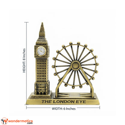 A decorative tabletop sculpture of London's Big Ben and The London Eye on a white background, with measurement lines indicating 8 inches height and 6 inches width. The product is metallic gold/brass-toned with black antiqued detailing.
