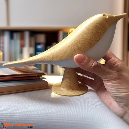 Close up of wood grain finish on bird shaped LED night light
