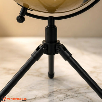 Black tripod stand base of decorative world globe