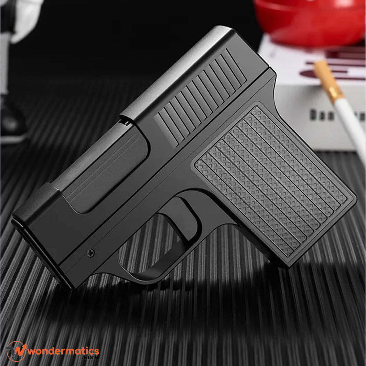 Black gun-inspired cigarette case with windproof lighter
