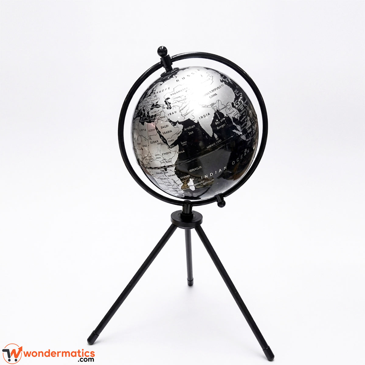 A black metal globe on a tripod stand, featuring a detailed map of Africa and surrounding continents, photographed against a seamless white background.