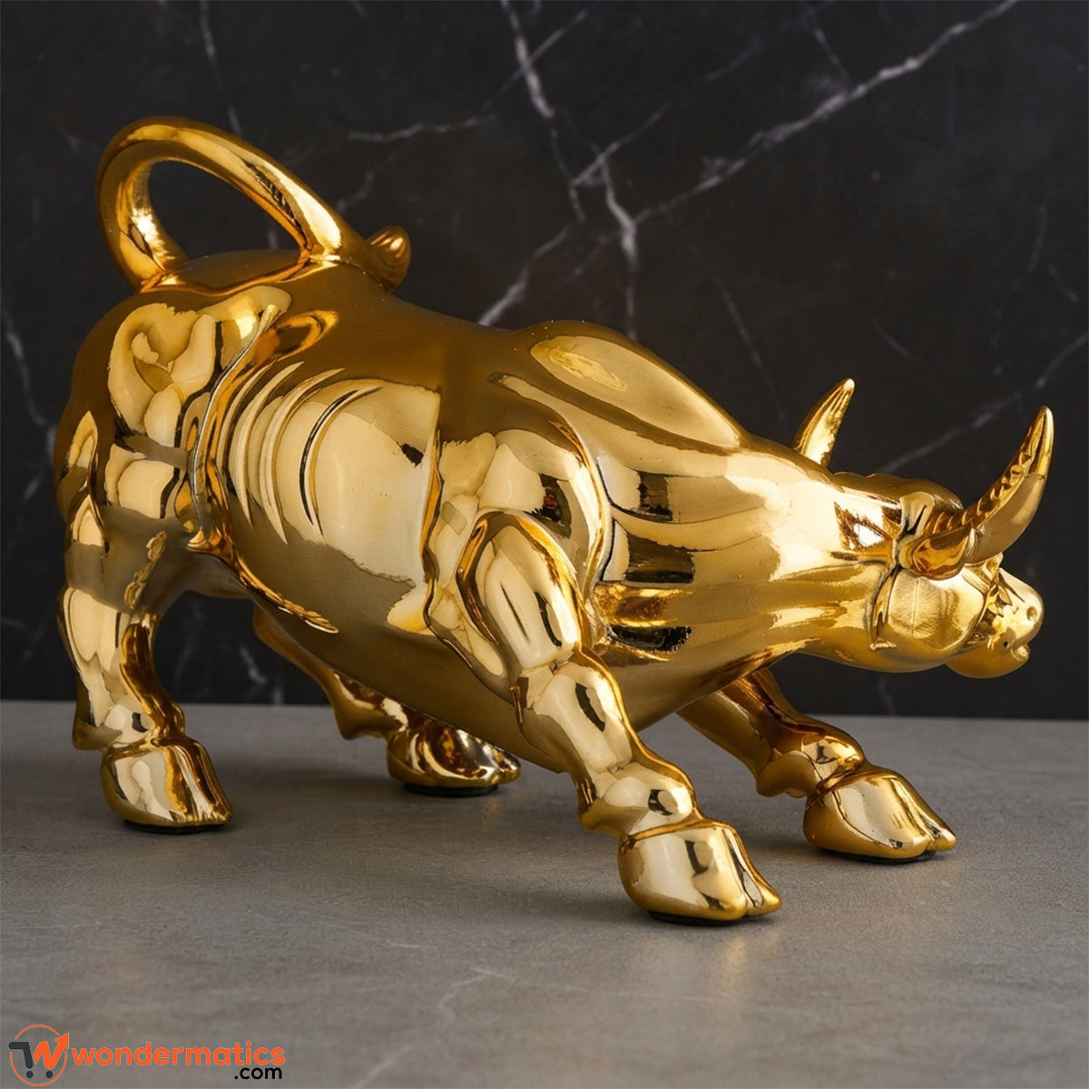 Side angle view of the gold charging bull figurine showing its dynamic pose