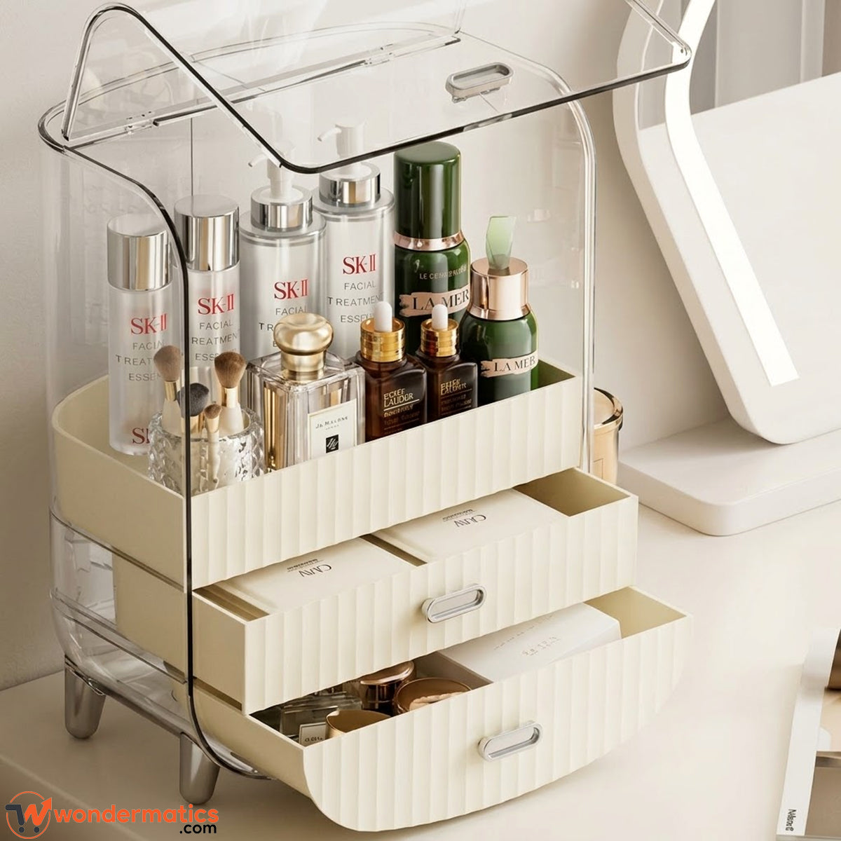 Cosmetic storage box placed on a vanity table with makeup items
