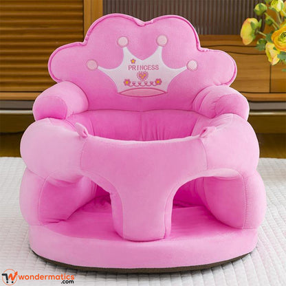 Front view of plush crown baby sofa seat for infants pink color