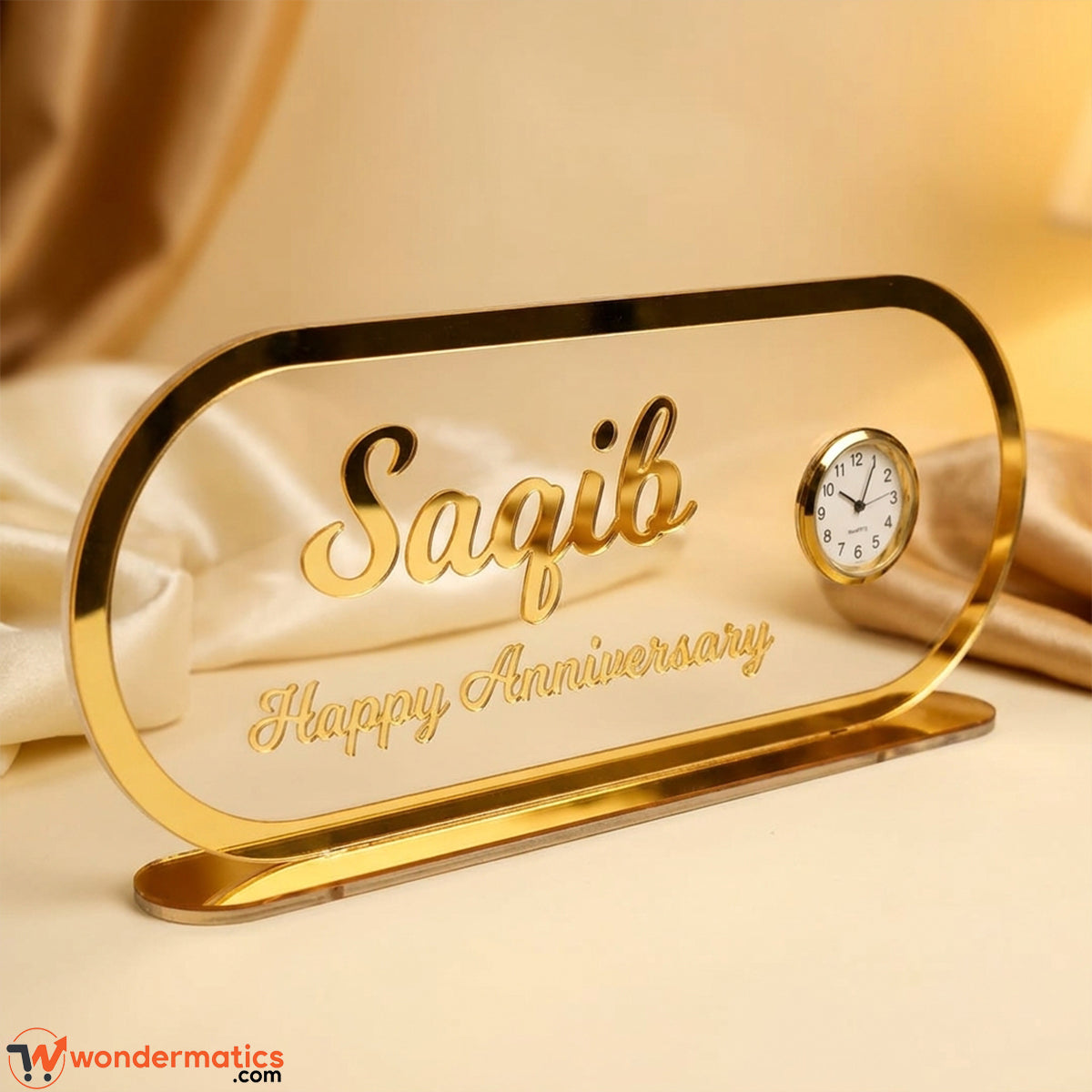 Left view of clear acrylic table clock with engraved golden name