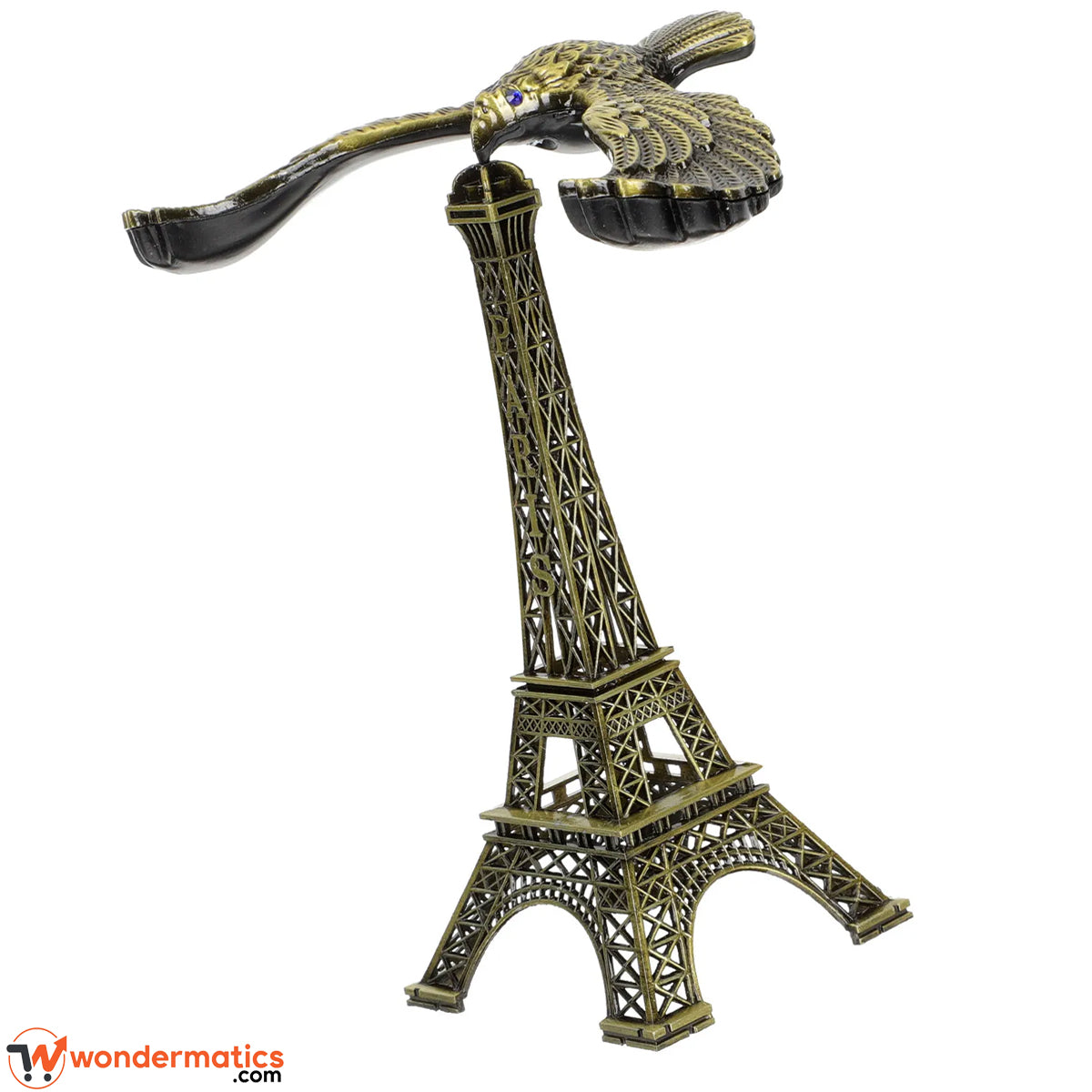Decorative eagle figurine with Eiffel Tower design displayed on a shelf, enhancing home and office interior aesthetics in Pakistan.