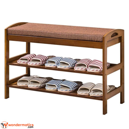 Space-saving wooden shoe rack with cushioned top seat offering organized footwear storage for entryway, bedroom and living room use.