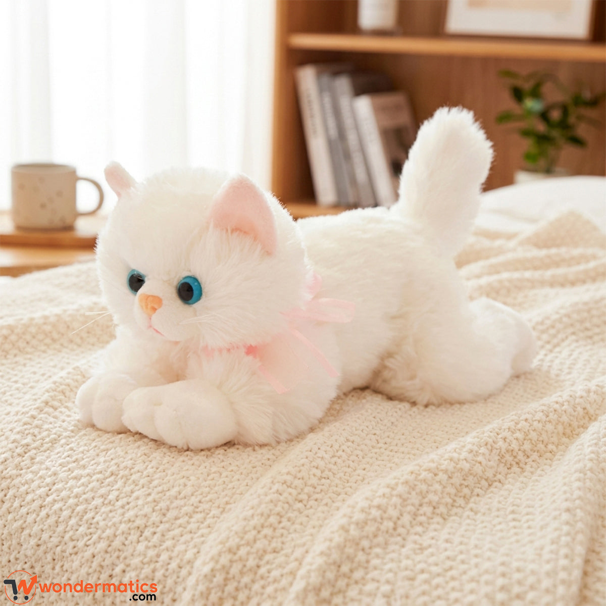 17-inch fluffy white Persian cat plush toy with bright blue eyes and pink ribbon bow