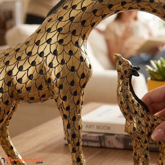 Close-up of the black scale-pattern detailing on the gold giraffe figurine