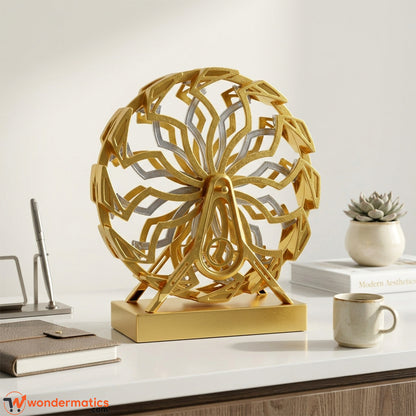 Gold kinetic Ferris wheel decor placed on an office desk