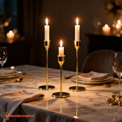 set of 3 golden metal candle stands for elegant home decor and table styling