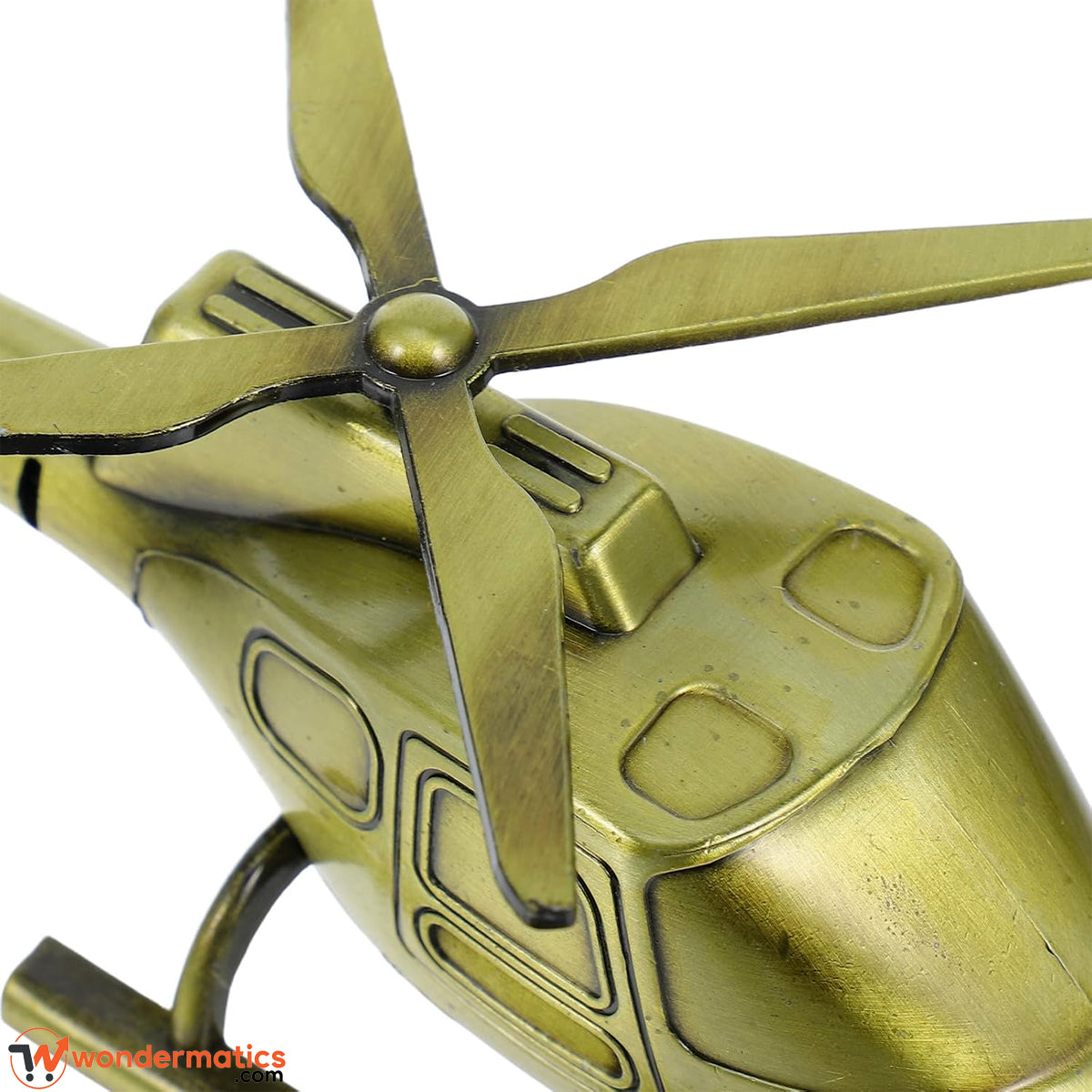 Close up of rotating top rotor on brass finish helicopter model