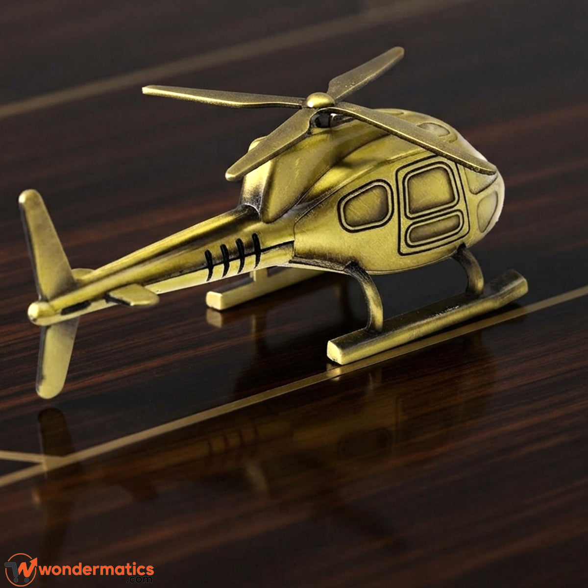 Brass finish helicopter showpiece displayed on office desk
