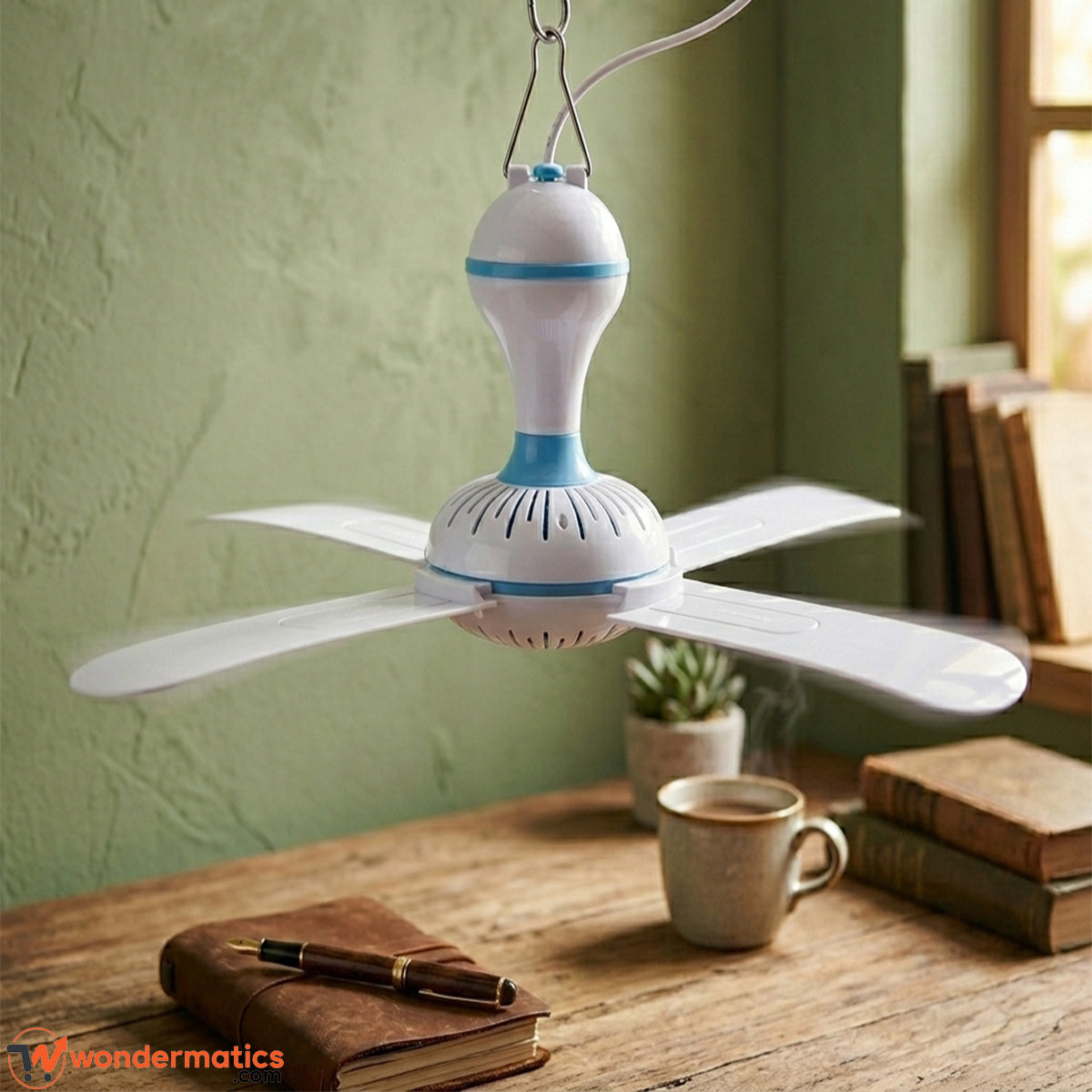 Small hook ceiling fan hanging in bedroom for cool air at home