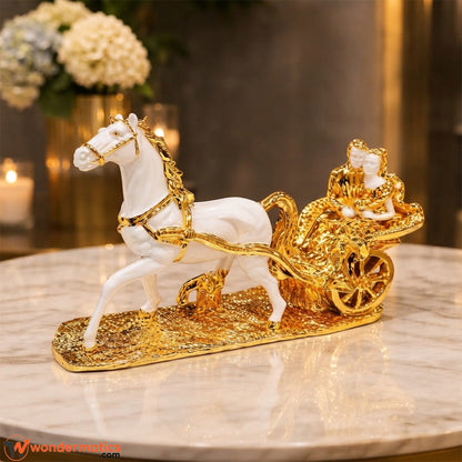 White and gold horse carriage couple showpiece displayed on a table