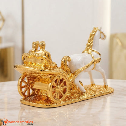 Side angle view of the white and gold horse carriage showpiece