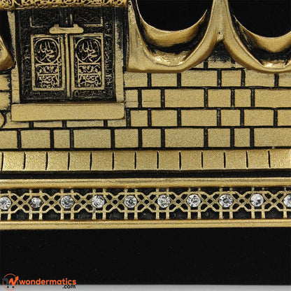 Close-up of sparkling rhinestone-embellished base on Kaaba showpiece