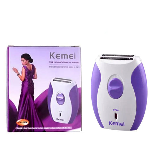 Kemei KM-280R women’s shaver in a flat lay with beauty accessories – ideal for home and travel grooming