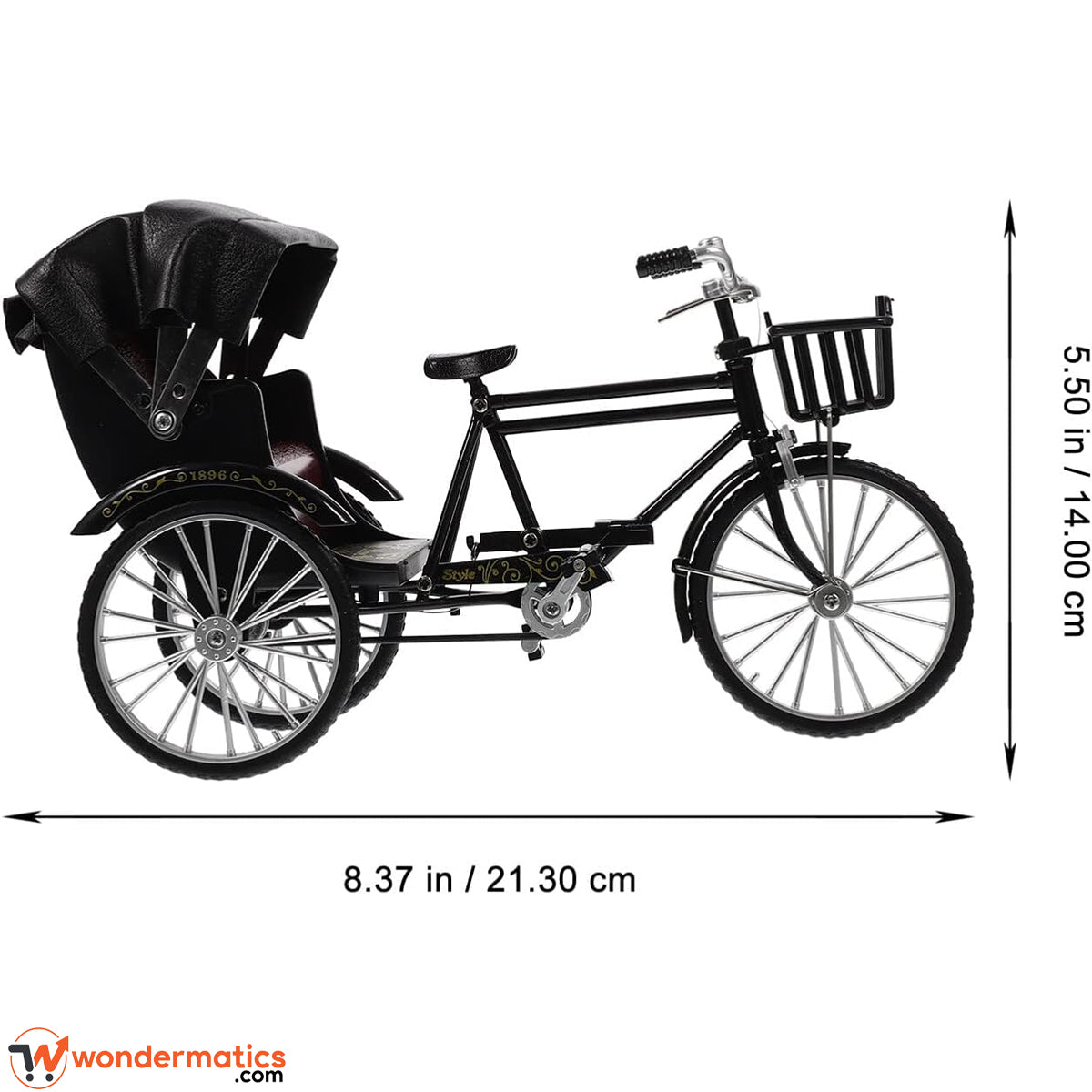 Metal rickshaw model shown for size reference on a desk