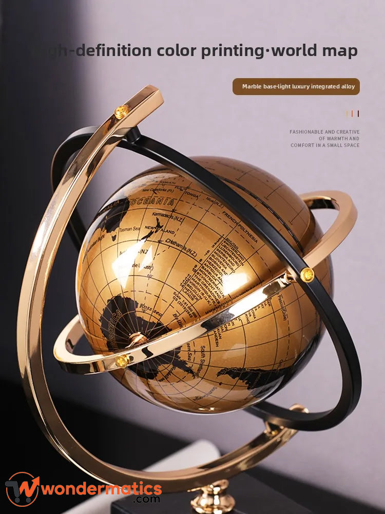 Modern decorative world globe collectible with black and gold finish