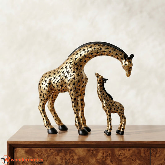 Mother and child giraffe figurine set in gold with black scale pattern