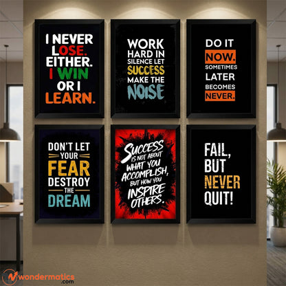 Six framed motivational wall art prints arranged in a 2x3 grid on a beige wall in an office-like interior. The prints feature black backgrounds with colorful text quotes including 'I Never Lose.