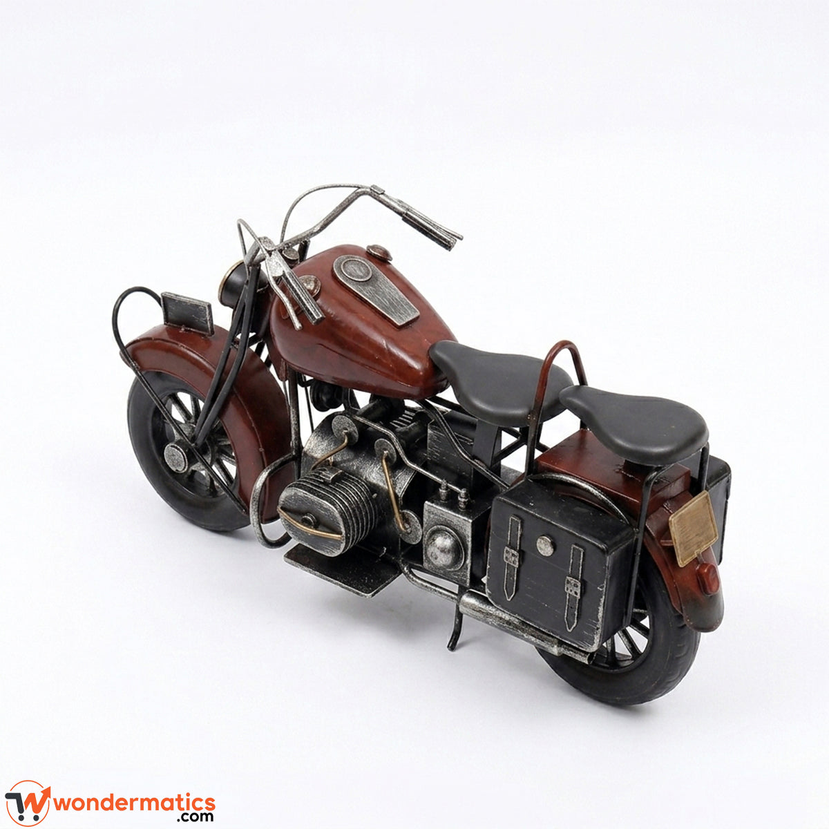Side angle view of vintage metal motorcycle showpiece
