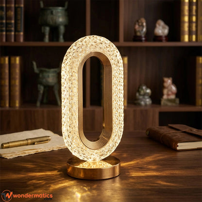 Crystal table lamp adding ambient light to office desk