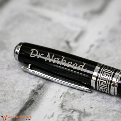 Close-up of custom engraved name detail on personalized pen