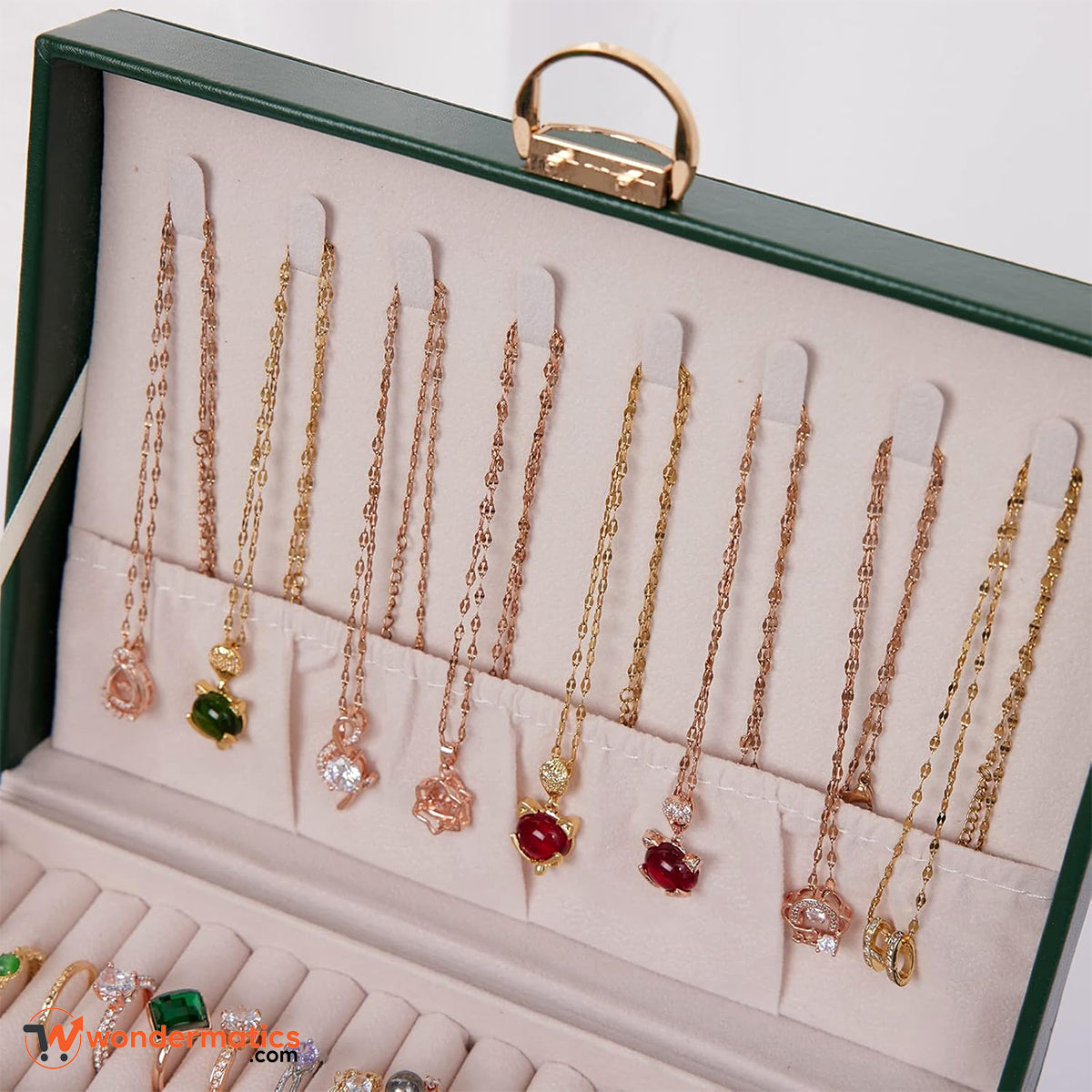 Quilted jewelry box with necklace holder lid and ring roll slots available in multiple colors