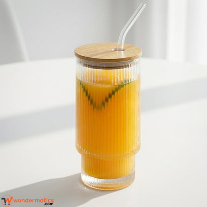 Ribbed glass tumbler 450ml with bamboo lid and glass straw on white background by Wondermatics