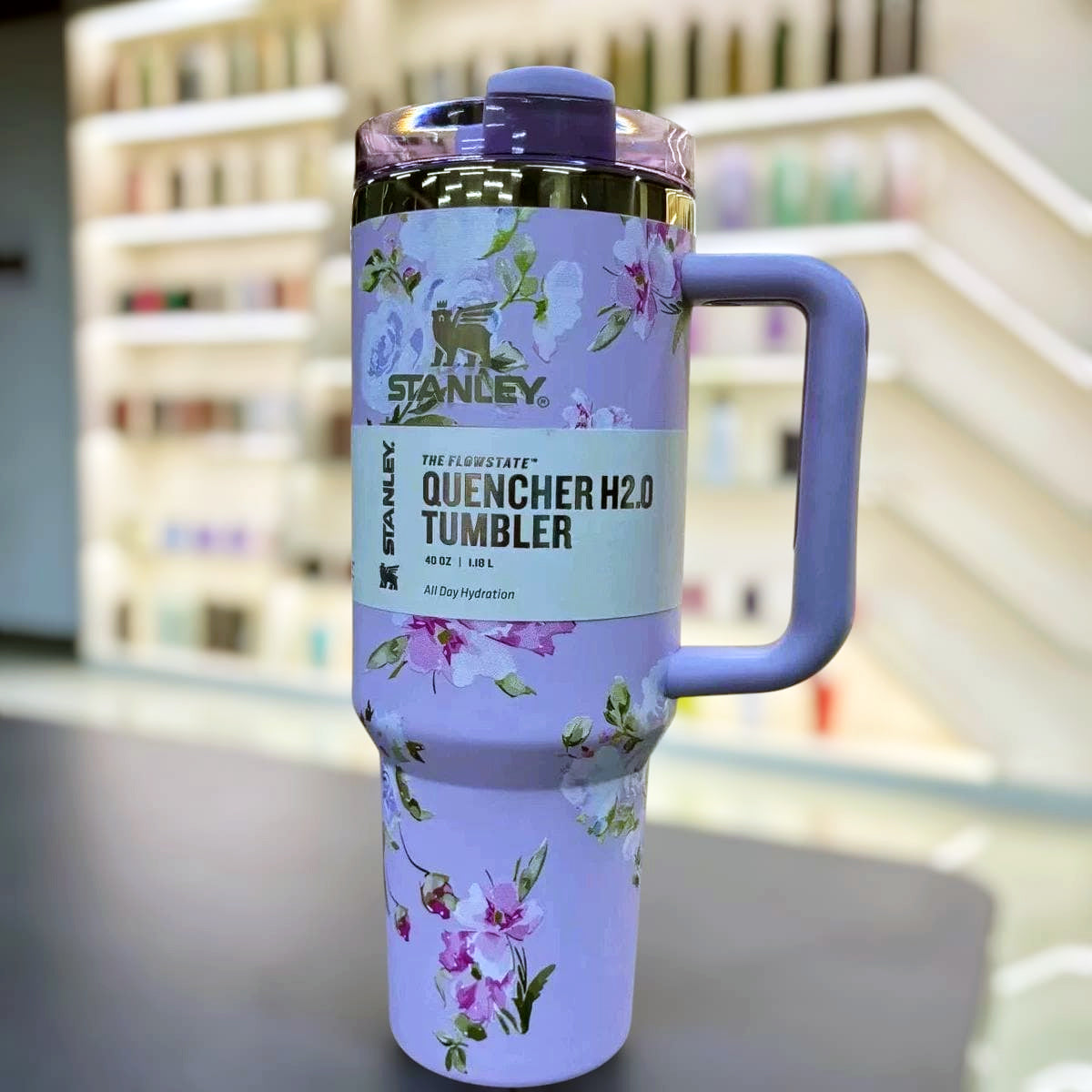 Limited edition Stanley LoveShackFancy tumbler in purple floral design, leakproof and BPA-free