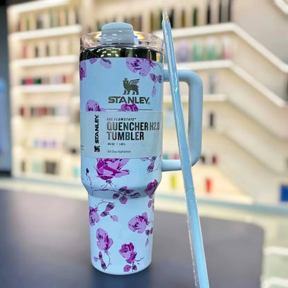 Elegant Stanley x LoveShackFancy white floral insulated tumbler, perfect for hot & cold drinks