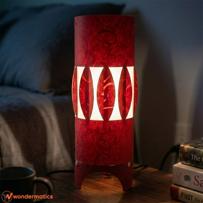 Red and white heat resistant table lamp placed on bedroom side table