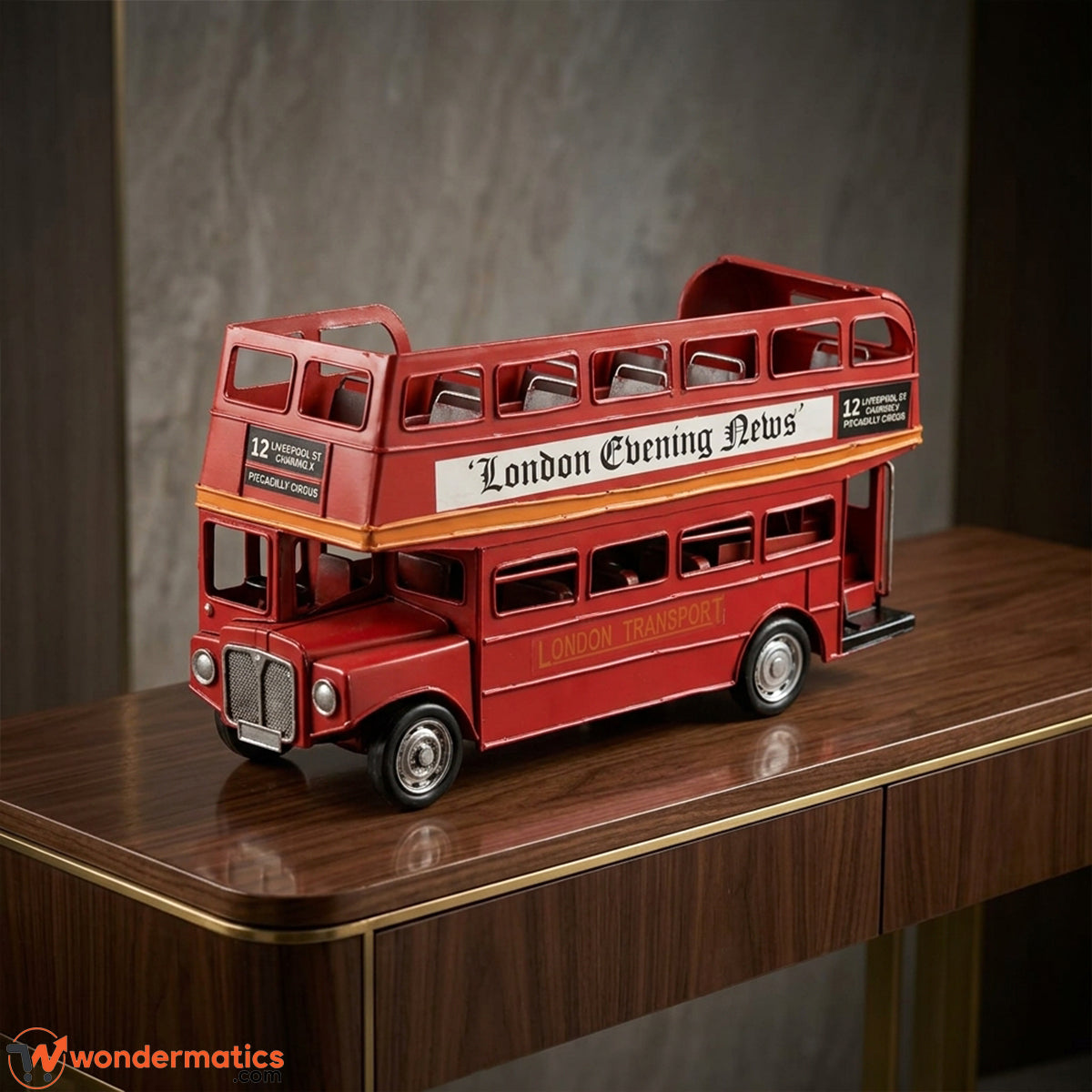 Handmade vintage red London double-decker open-top bus model displayed on an office desk