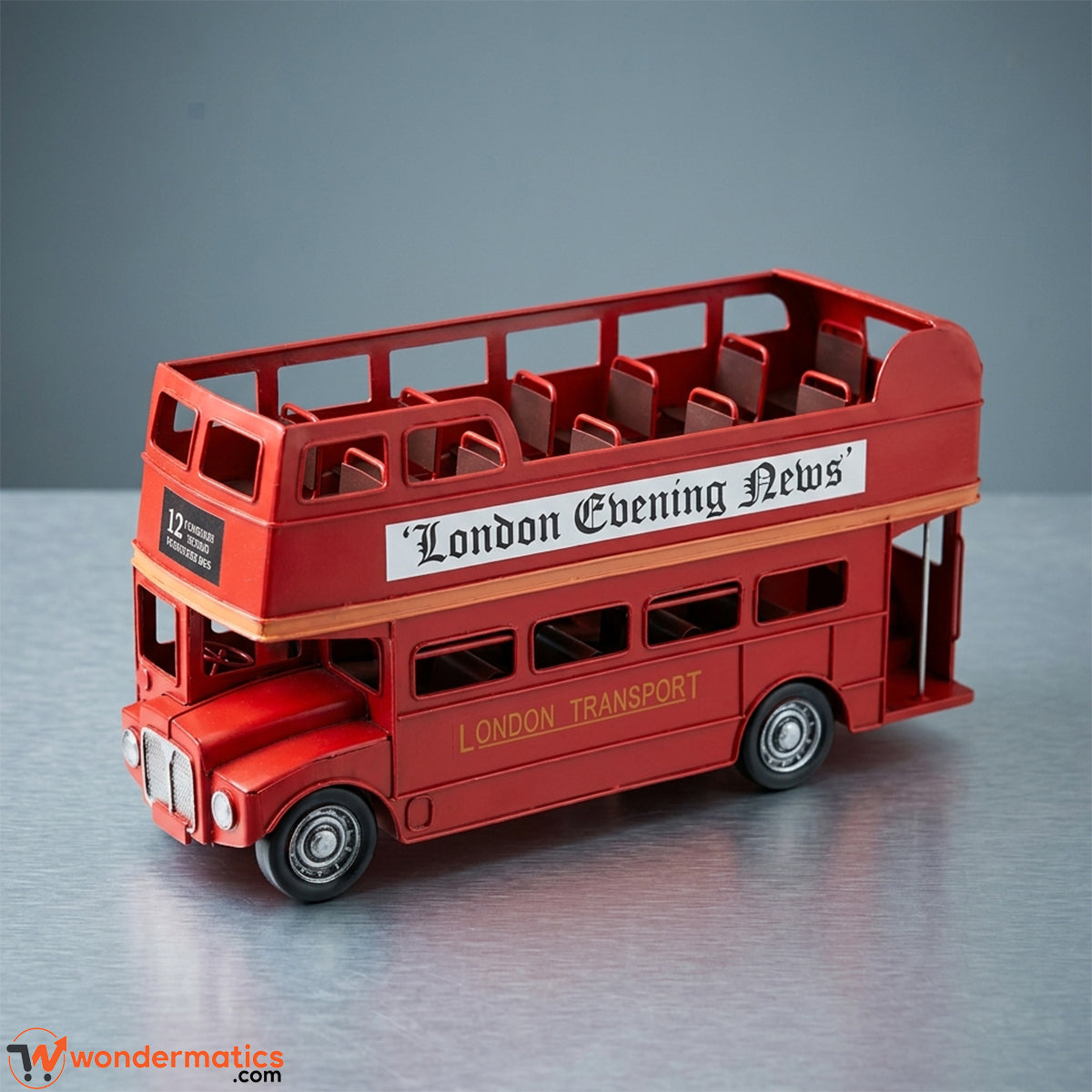 Handmade vintage red London double-decker open-top bus model, front three-quarter view