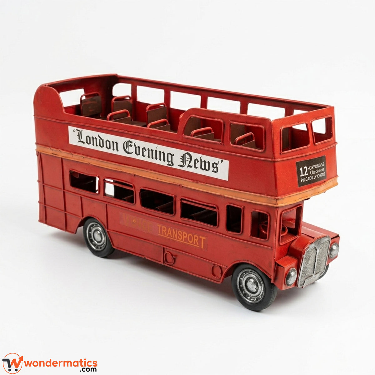 Side profile of vintage red tinplate double-decker bus model showing full length and window detailing