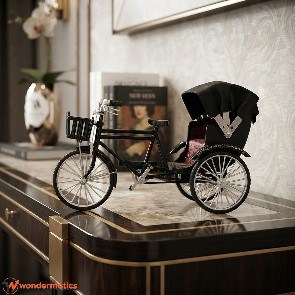 Vintage rickshaw model displayed as a bookcase and desk ornament