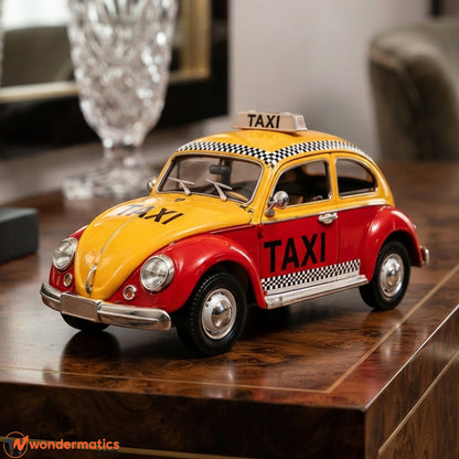 Vintage Volkswagen Beetle taxi model displayed on a table as home and office decor