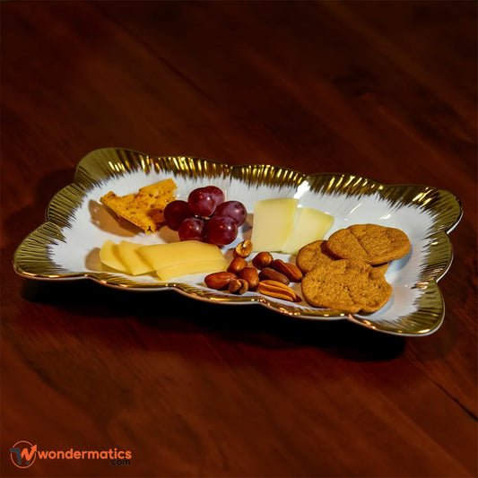 White ceramic rectangular serving platter with gold border for elegant dining