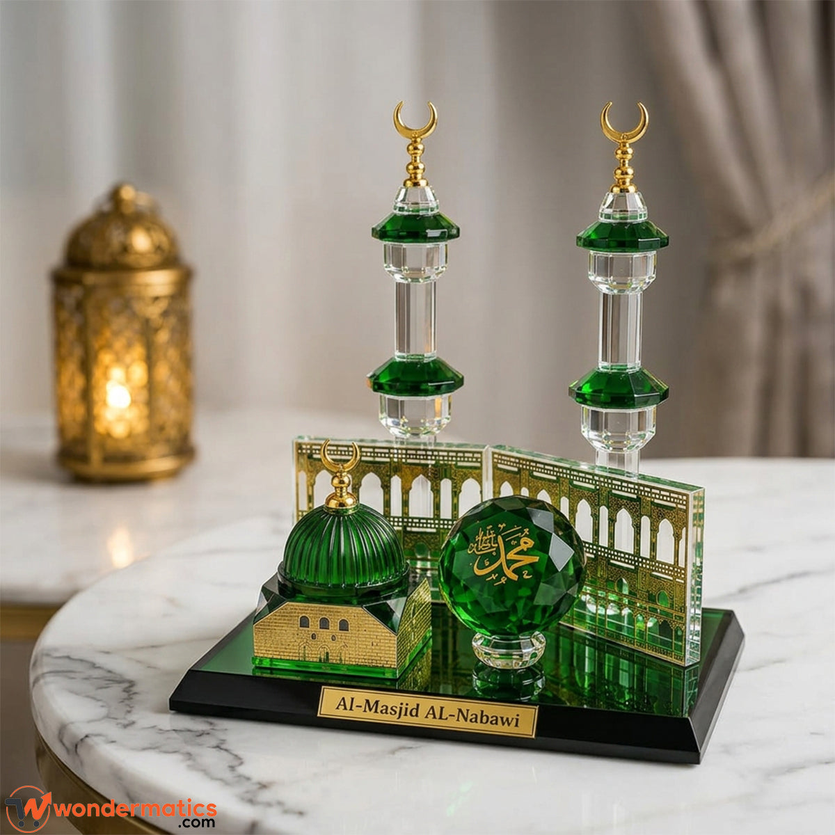 Al-Masjid Al-Nabawi crystal showpiece with green dome, twin minarets, and gold nameplate displayed on a marble table