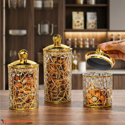 Wondermatics 3-piece acrylic Arabian kitchen storage jar set with gold geometric design on table
