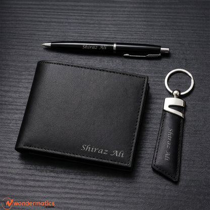 Flat lay of wallet, keyring and pen gift set arranged together