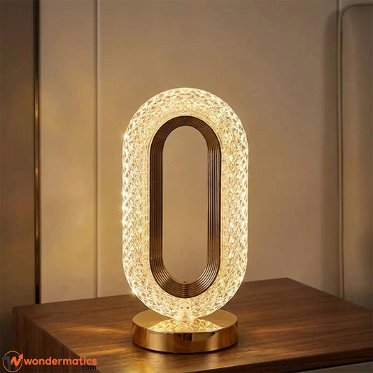 Crystal touch lamp glowing in warm yellow light mode